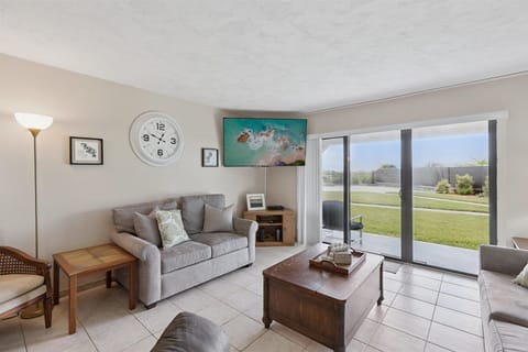 Brigh & airy living room with ground floor walkout patio