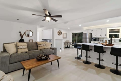 Enjoy family and friends in the living room and kitchen bar