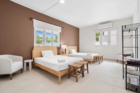 Bright, modern room with two comfy beds for a great night's sleep.

