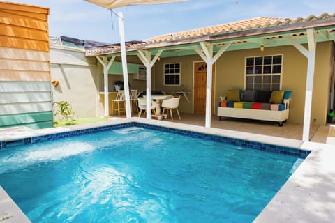 Refreshing private pool with shaded lounge area