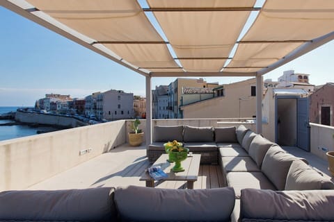 It's nearly aperitif time on the roof terrace.