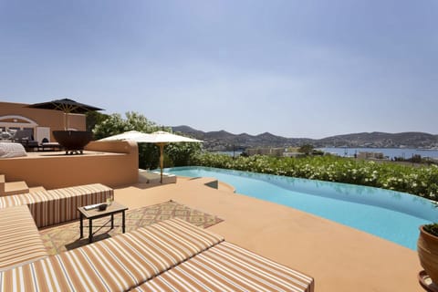 Restful views from the lounging terrace above the pool.