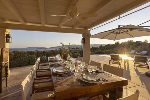 The shady, sea-view al fresco dining area down on the pool terrace.