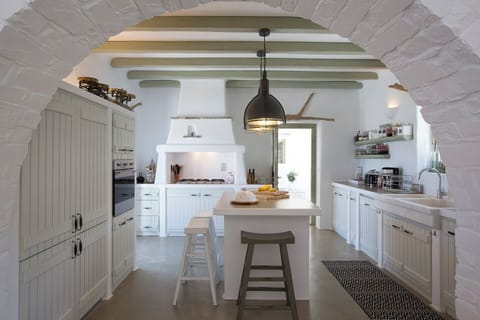 Heading through to the main house's well-equipped kitchen.