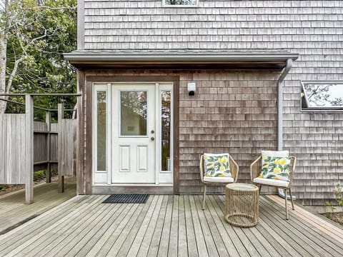 Front door with deck and outdoor shower