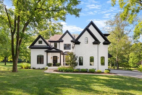 Large private home fully furnished with 3 car garage and large fenced-in backyard.