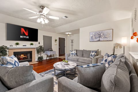 Spacious living room with cozy seating for everyone