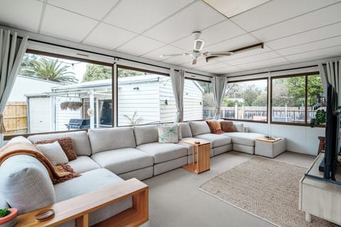 Bright and Airy living room where you can relax and enjoy your movies.