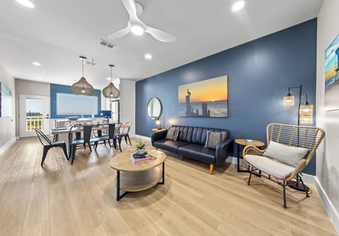 Your bright and spacious living room features plenty of natural light, easy balcony access, and an open layout ideal for everyday living and leisure.