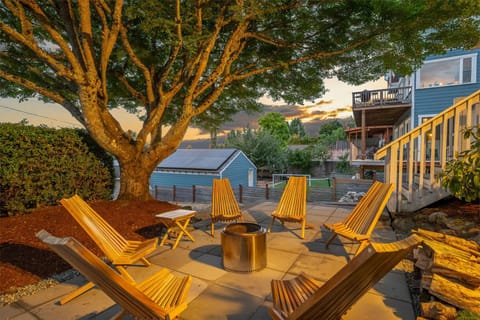Evening glow from the backyard fire pit area, tucked into the trees.