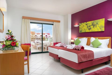 Wake up to sunshine and step onto your private balcony.