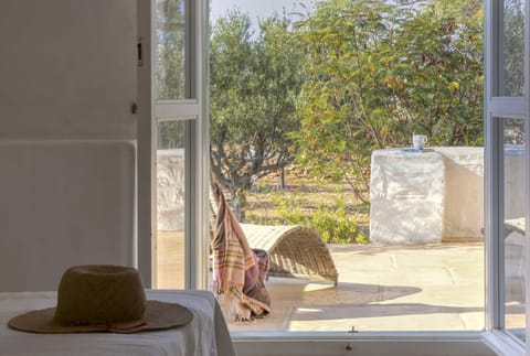 It too opens out onto a terrace.