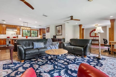 The living room is large, cozy and great for gathering.