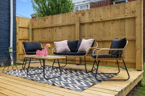 The back deck outdoor seating area welcomes you and your guests for outdoor fun!