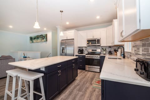 Private kitchen featuring polished granite surfaces