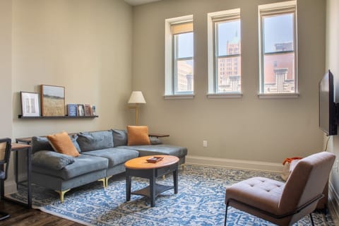 Spacious living room with dedicated workspace