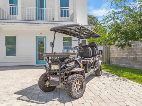 Convenient golf cart available for easy local transportation.