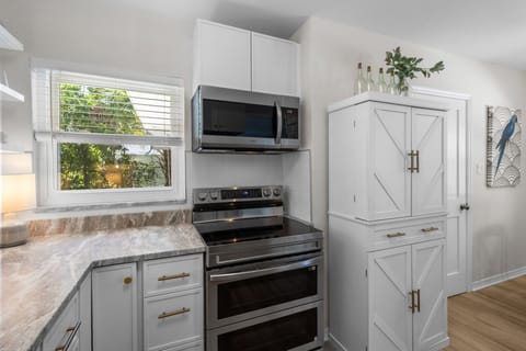 Main House: Kitchen and dining area, double stove.