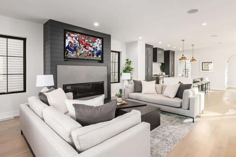 Open Living Room with 65" Smart TV for entertaining