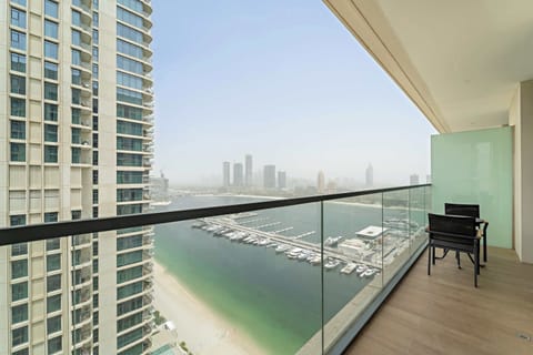 Balcony soaking in warm light & calm water views