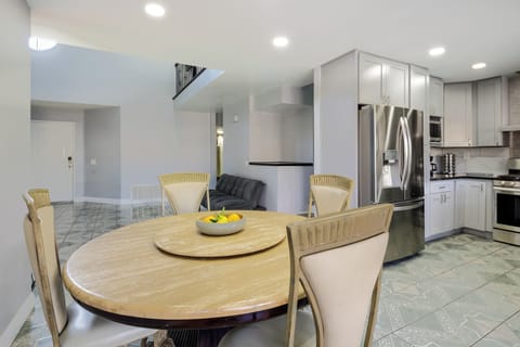 Open living-to-dining layout with great natural light and backyard access.
