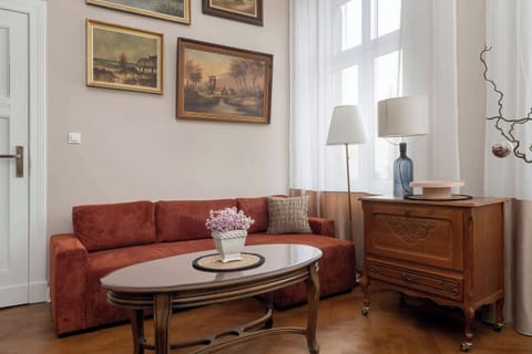 Living room with a comfortable sofa and TV. 