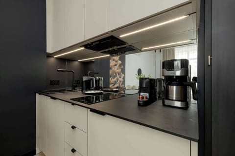 The kitchenette's practical layout maximizes space and functionality.