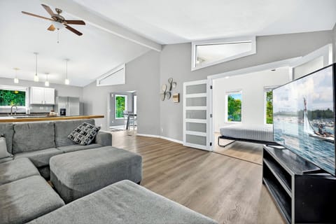 Cozy up on the large couch and stream your favorites on the smart TV