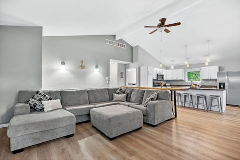 Cozy up on the large couch and stream your favorites on the smart TV