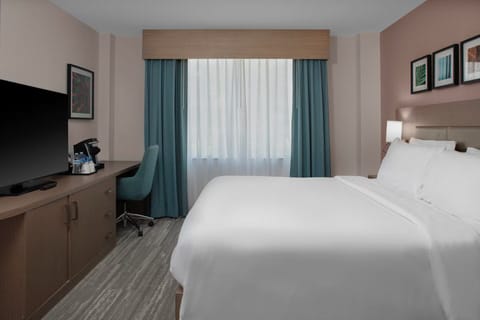 Relax with your favorite show from the comfort of bed.