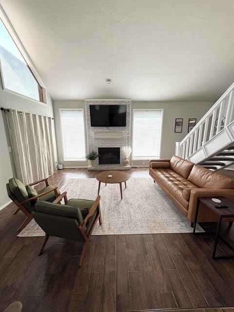 Living room area with a 65in TV