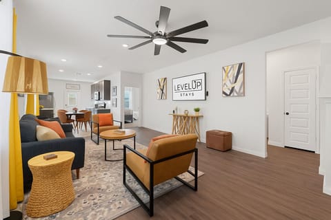 Relax in a spacious living room with TV setup