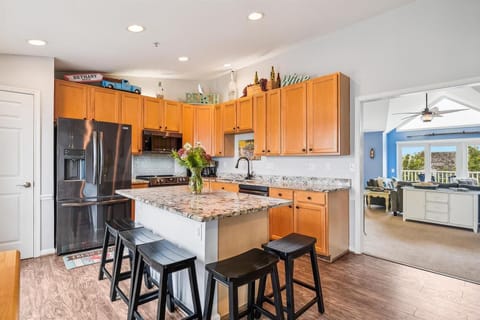 Additional kitchen seating around granite island