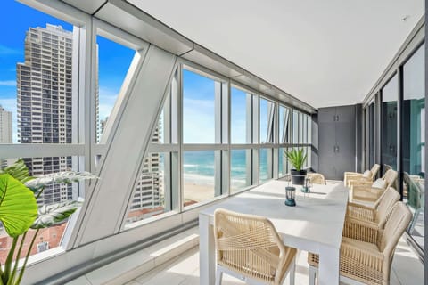 Generous balcony space with seating for the whole group to relax together.
