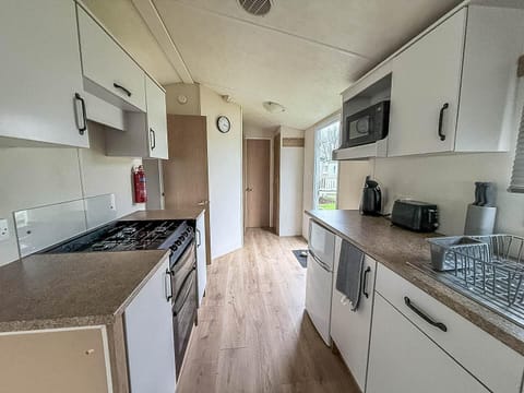 Bright, modern kitchen with ample counter space and natural light