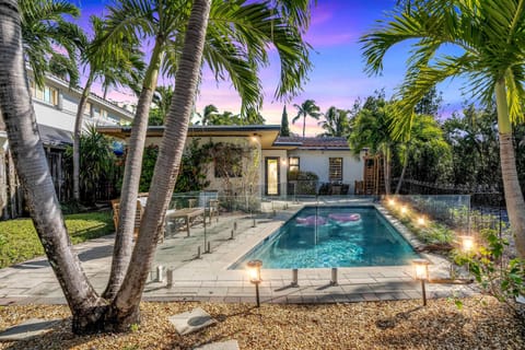 Sparkling Pool Surrounded by Palm Trees