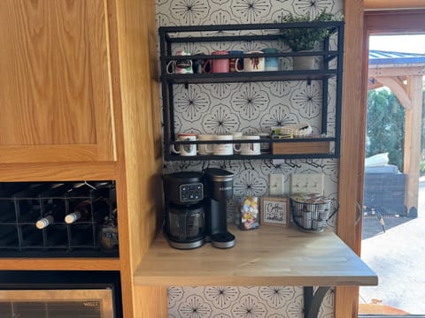 dedicated coffee/tea bar to fuel your mornings & built-in beverage refrigerator