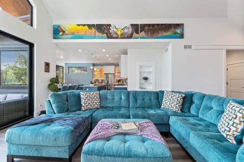 Nestle in together on this spacious, opulent couch making it comfortable for the whole family | main Level