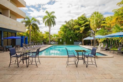 Stretch out poolside and savor breezy resort-style calm.