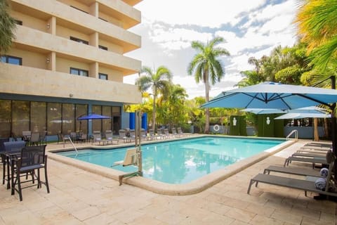 Outdoor pool, open 6:00 AM to 10:00 PM
