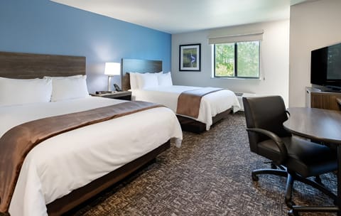 Stretch out in a spacious double-queen room after exploring all day.