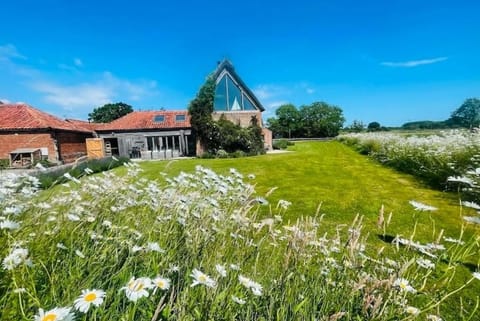 Private grounds and stunning views across meadows to the river hundred