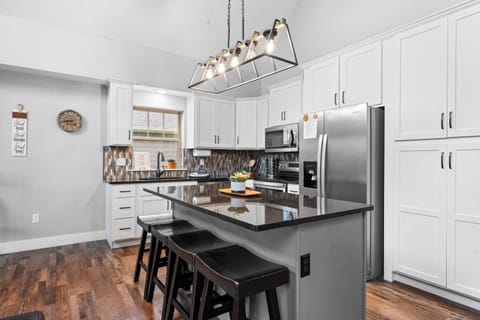 The open kitchen offers ample space & all the comforts of home​