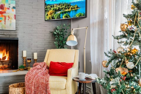 Enjoy this cozy spot next to the Christmas tree