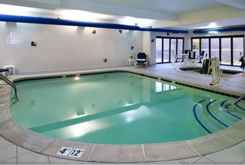 Float peacefully in the indoor pool under soft lighting.