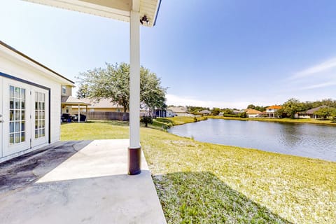 Extend your living space outdoors with a dramatic, shaded lanai built for open-air relaxation.