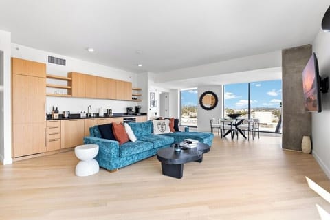 Seamless flow from the kitchen to the living and dining areas.