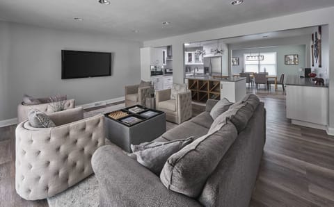 Curl up in the chic living room & stream your favorites on the smart TV​