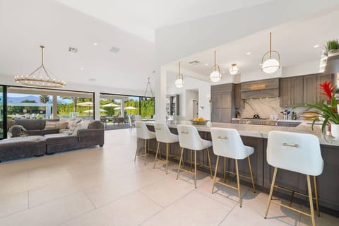 Open flow living and ample seating at the kitchen counter