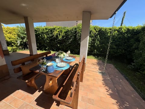 Furniture, Wood, Outdoor Furniture, Table, Outdoor Table, Wood Stain, Garden, Hardwood, Shade, Chair